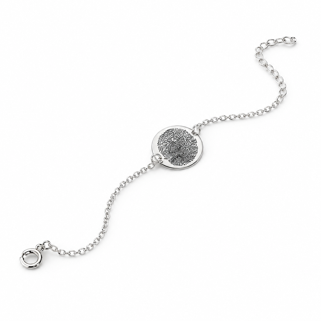 Silver fingerprint bracelet with a round disc engraved with a real fingerprint