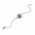 Silver fingerprint bracelet with a round disc engraved with a real fingerprint