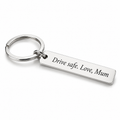 Personalised engraved bar keychain in polished silver with a custom message