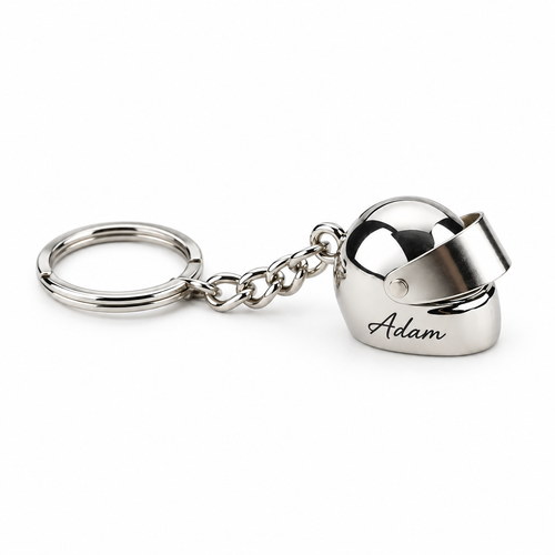 Personalised mini motorcycle helmet keychain in polished silver engraved with a name