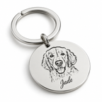 Engraved pet portrait keychain in polished silver with a dog portrait and name