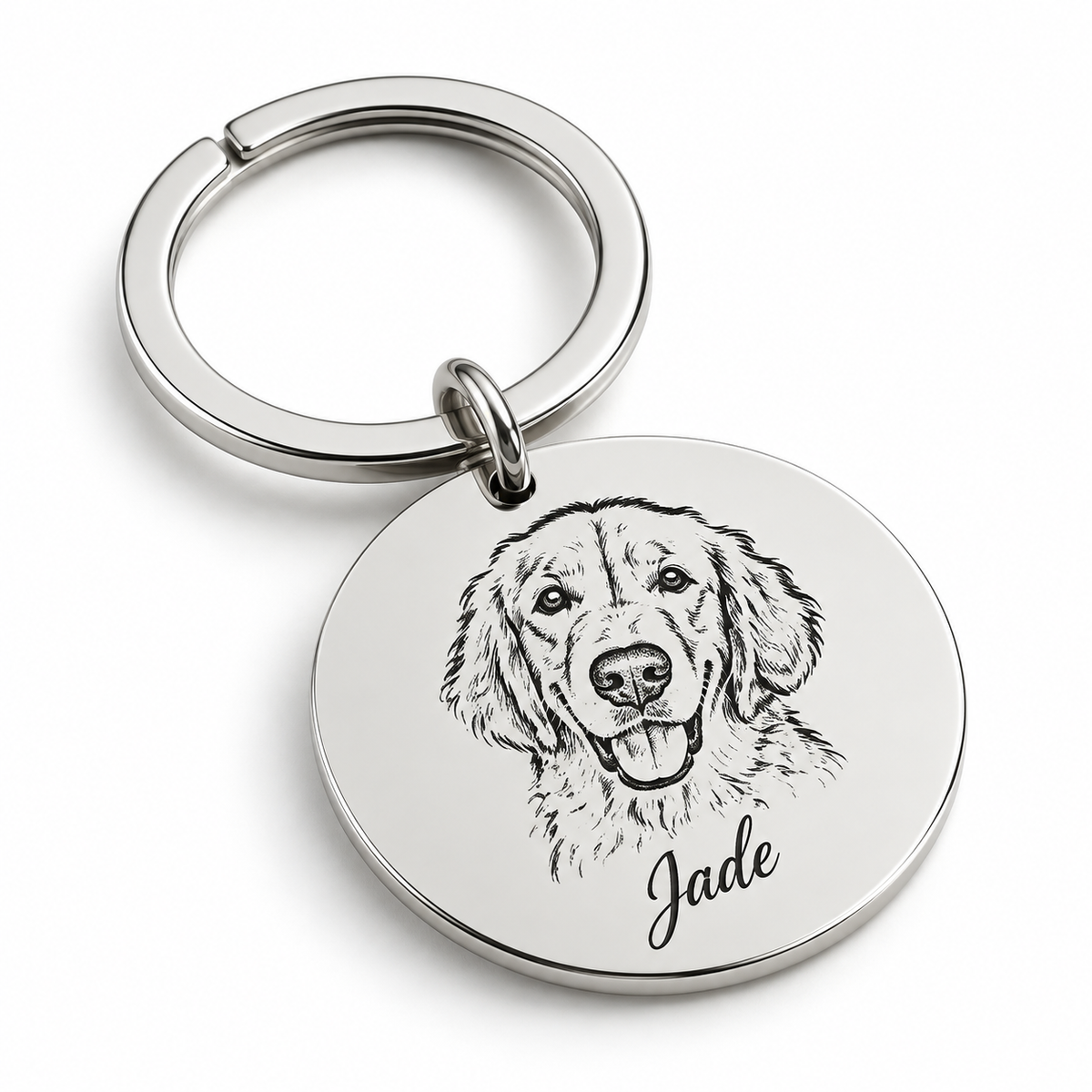Engraved pet portrait keychain in polished silver with a dog portrait and name