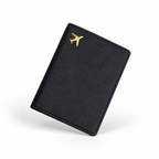 Black leather passport holder with gold aeroplane charm
