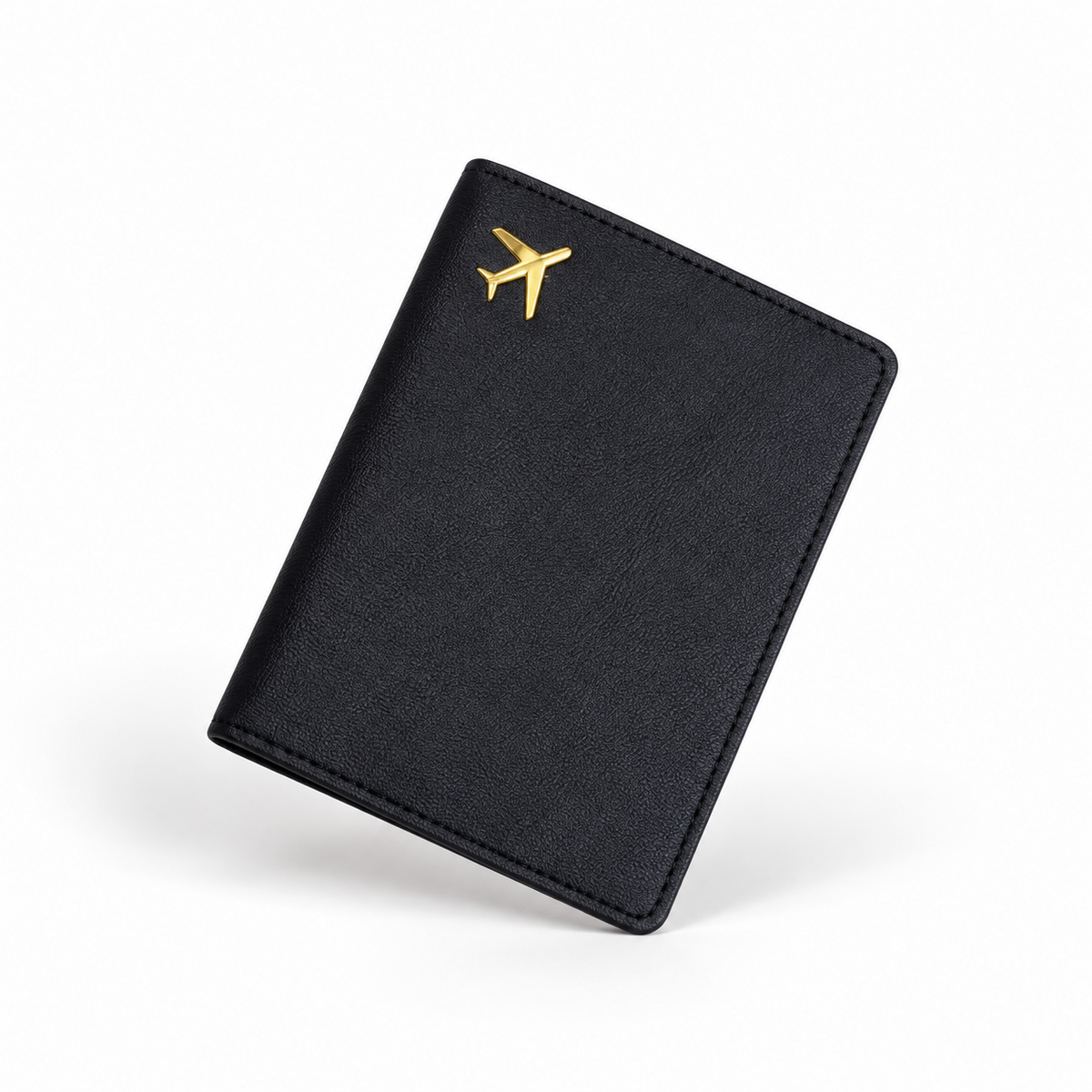 Black leather passport holder with gold aeroplane charm