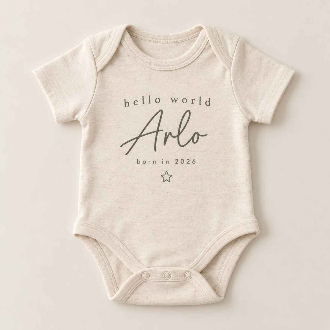 Personalised baby bodysuit with Hello World name announcement print