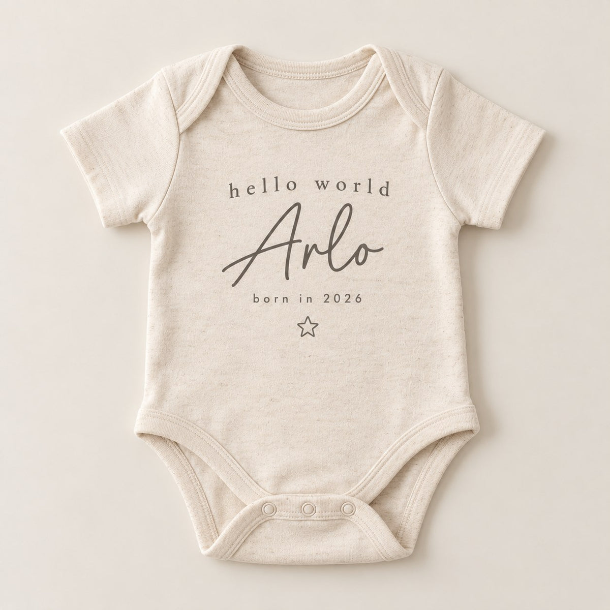 Personalised baby bodysuit with Hello World name announcement print