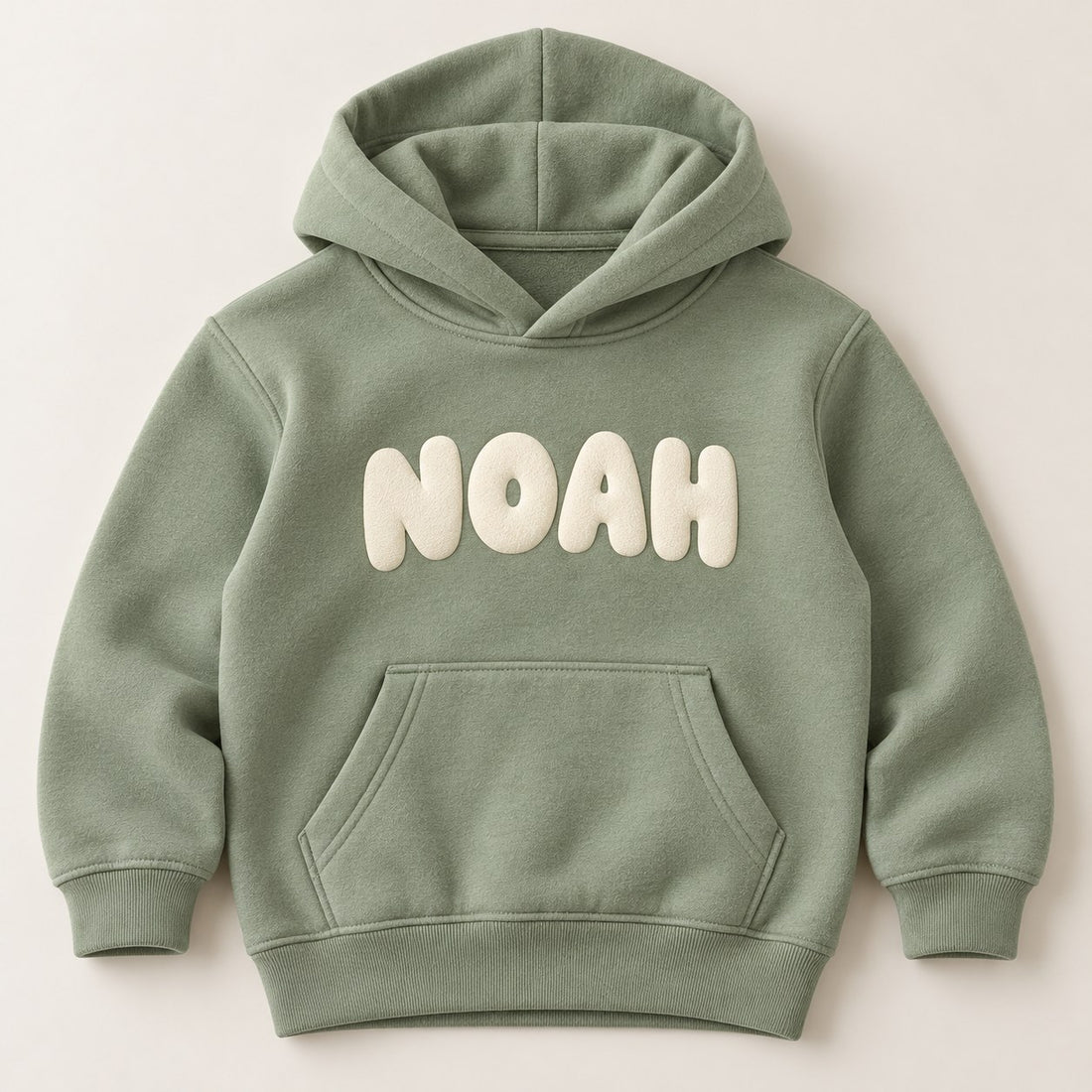 Personalised kids hoodie with child's name in bold rounded lettering