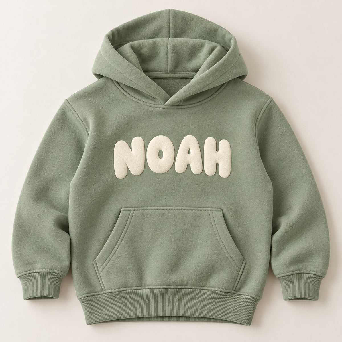 Personalised kids hoodie with child's name in bold rounded lettering