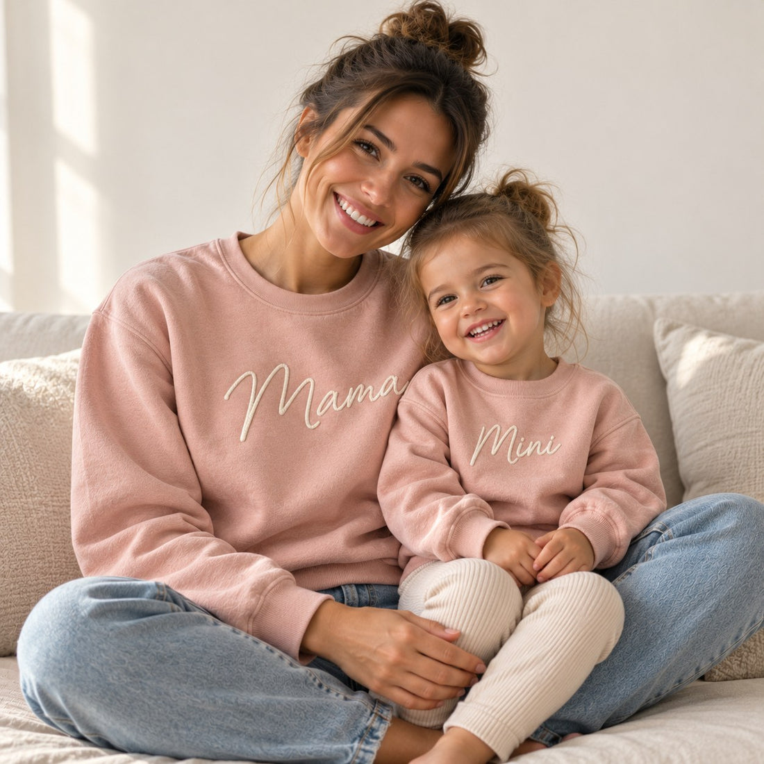 Mother and toddler wearing matching personalised Mama and Mini sweatshirts