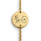 Personalised gold disc bracelet engraved with two country outlines and hearts