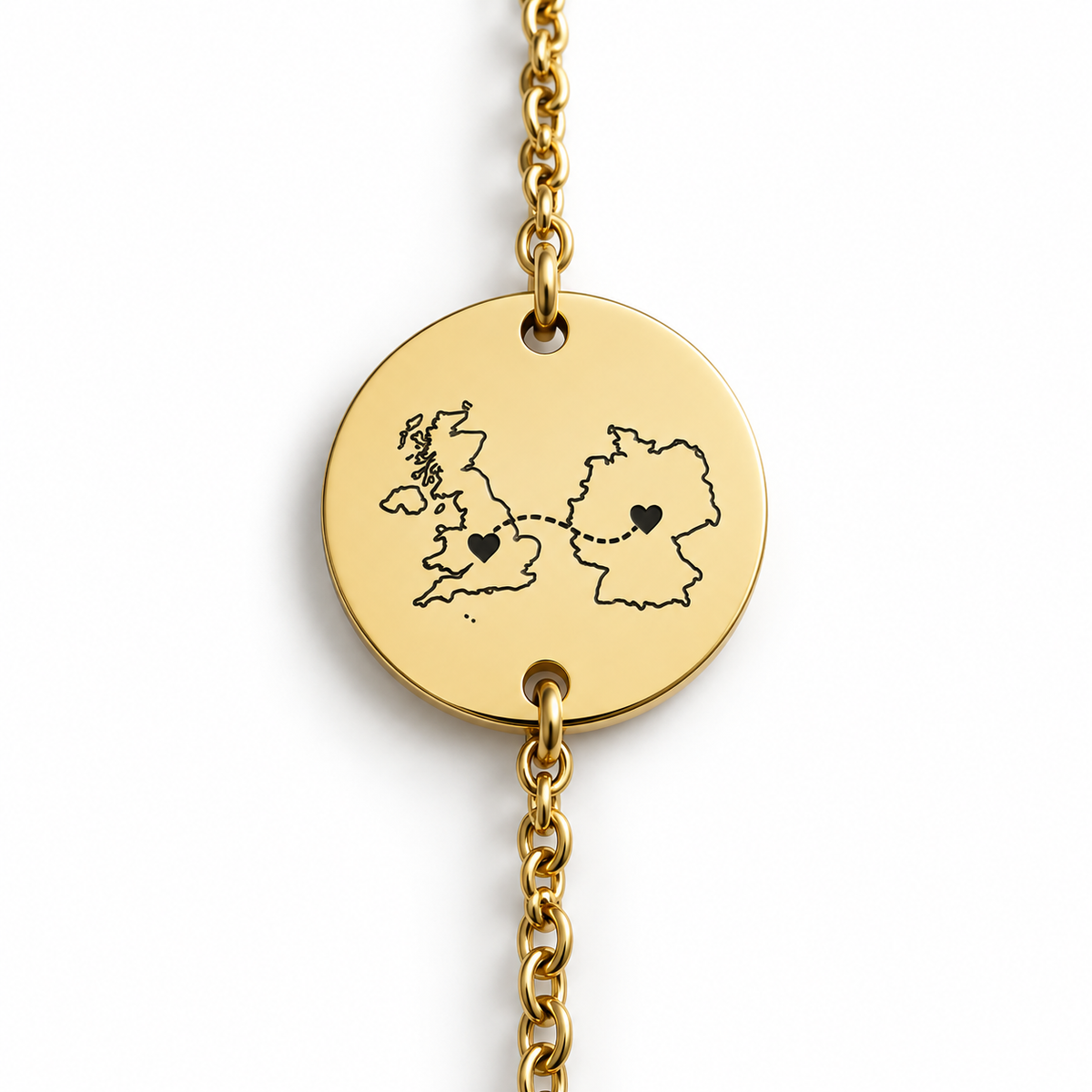 Personalised gold disc bracelet engraved with two country outlines and hearts