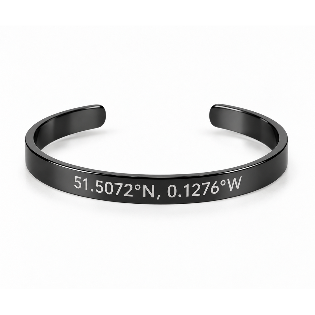 Personalised black cuff bracelet engraved with coordinates