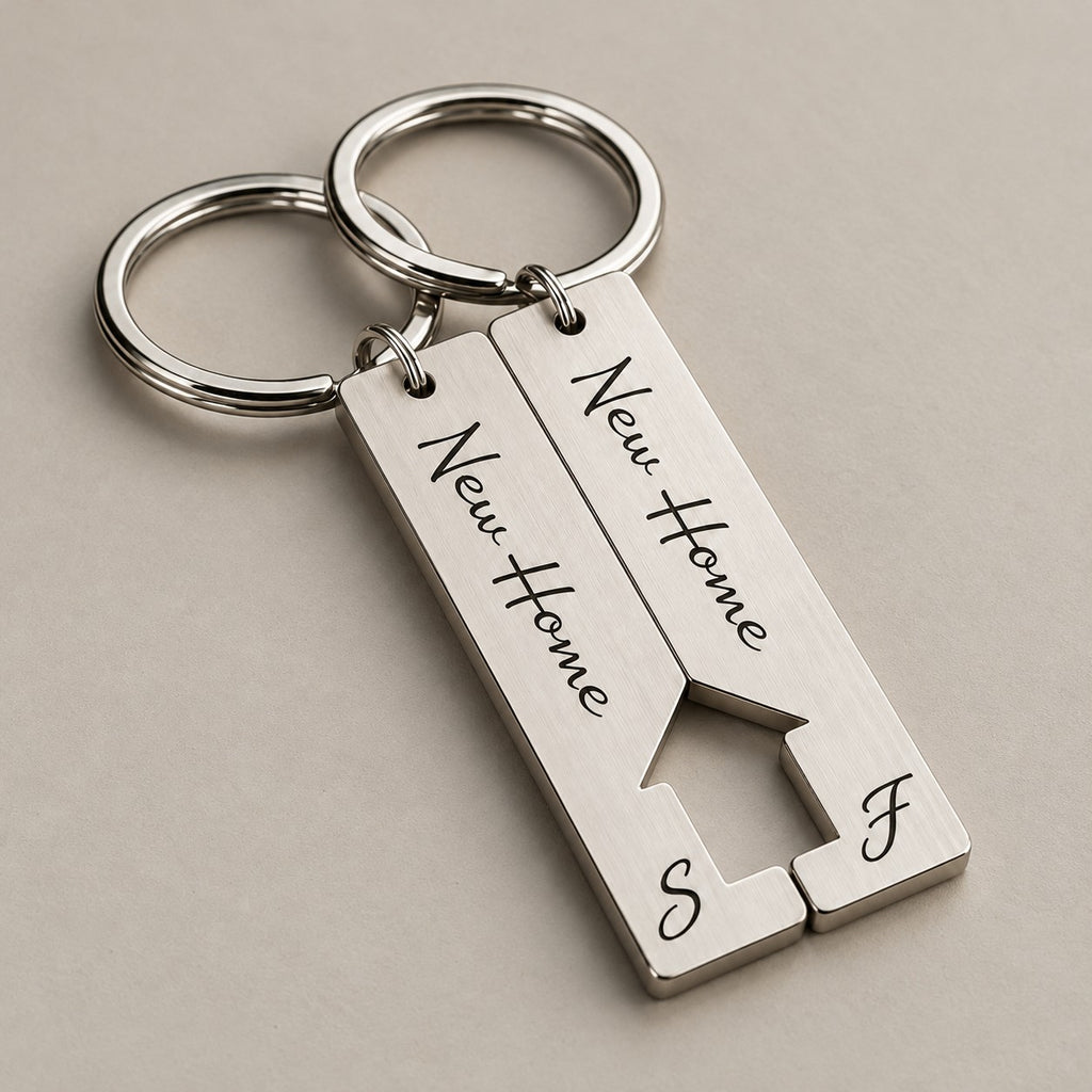 New home keychain set on a greige surface
