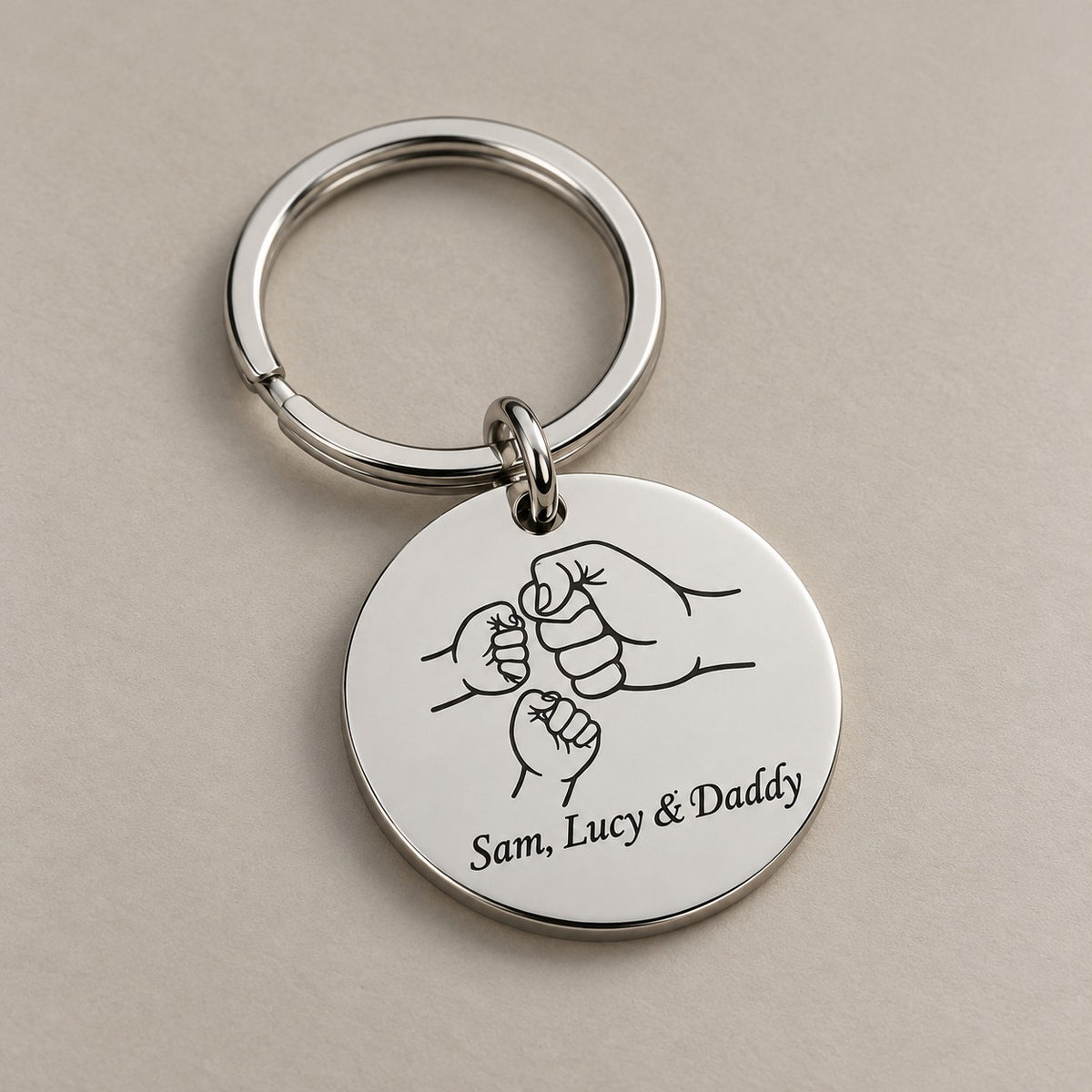 Personalised dad mum keychain on a greige surface