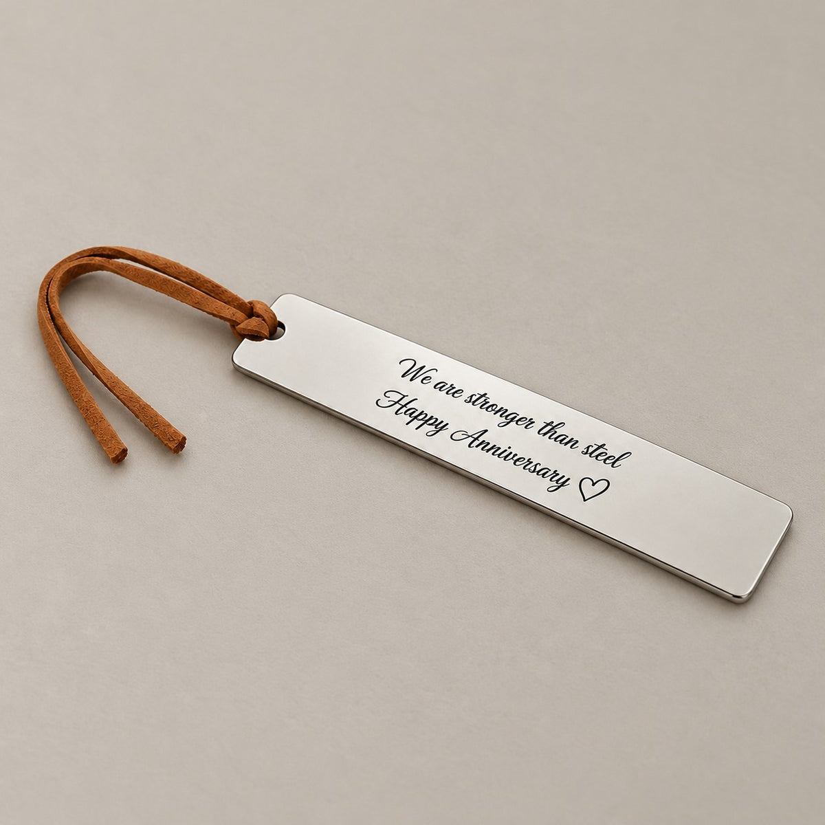Personalised bookmark on a greige surface
