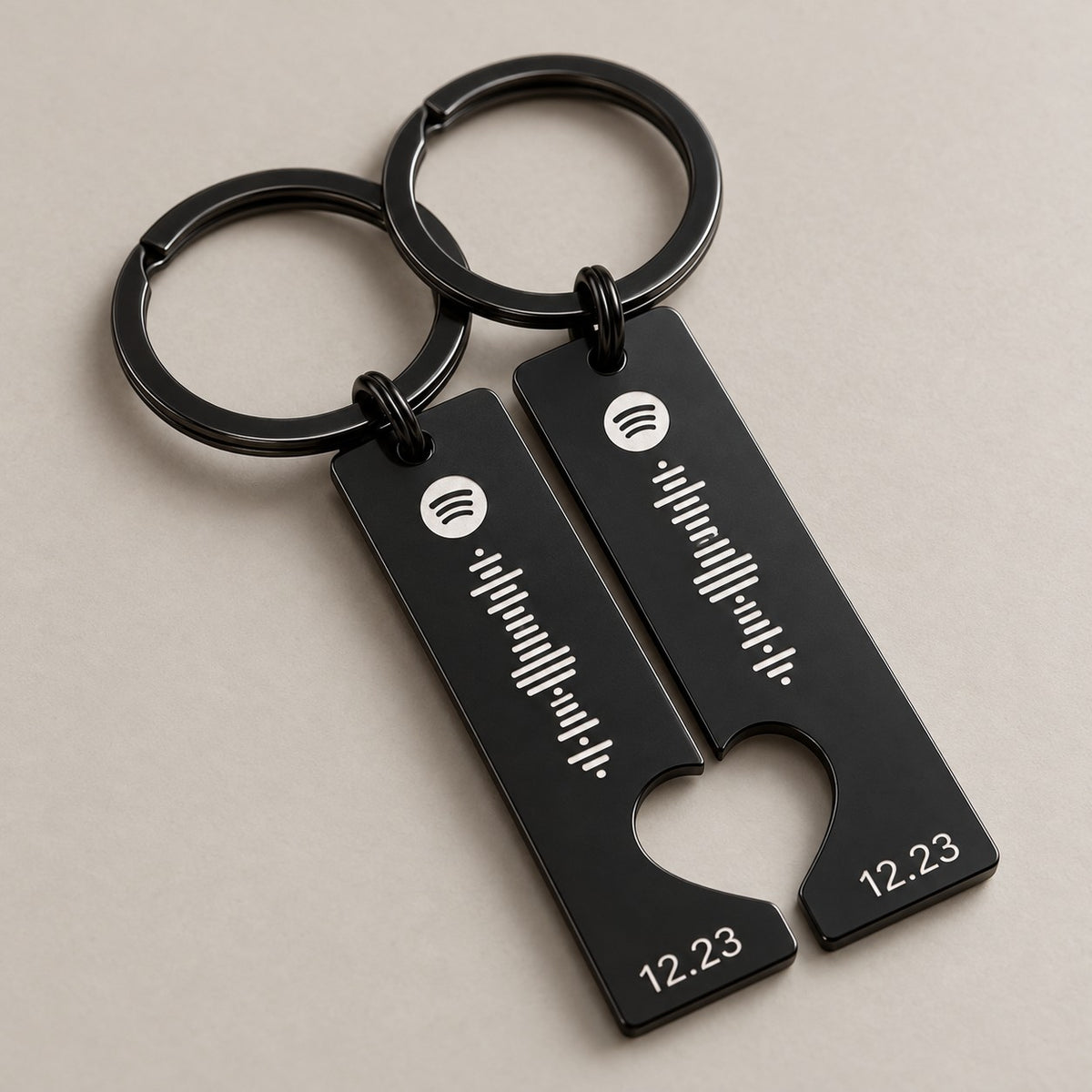 Matching Spotify scannable keyrings on a neutral surface