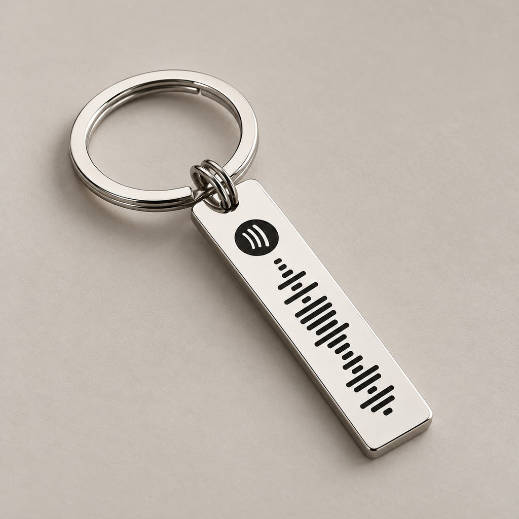 Spotify scannable keyring on a neutral surface