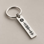 Spotify scannable keyring on a neutral surface