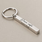 Personalised bar keychain on a greige surface