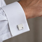 Personalised cufflink on shirt cuff