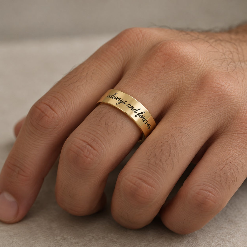 Personalised engraved ring worn on finger