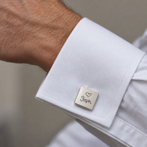 Personalised cufflink on shirt cuff