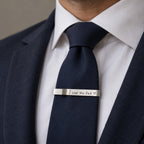 Custom Signature Handwriting Tie Bar worn on a navy tie